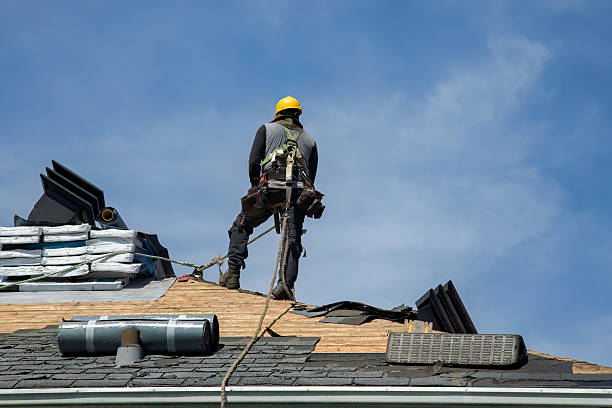 Professional Roof Replacement technician working in Goshen, MA